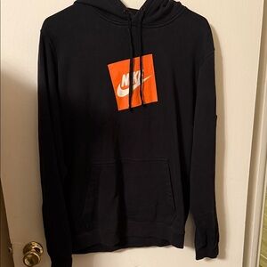 Nike Black Hoodie with Bold Orange Accent